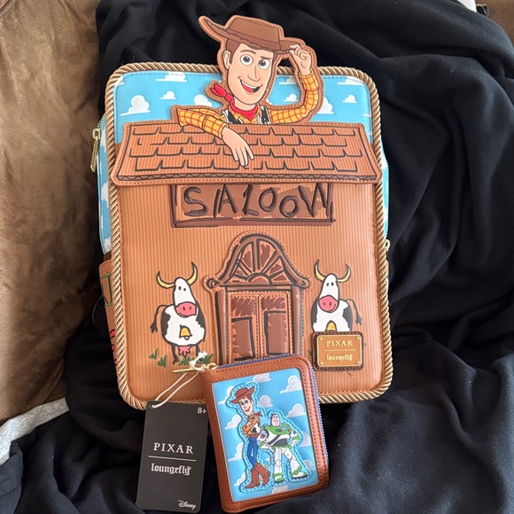 Loungefly Handbags - Loungefly Pixar Woody Saloon Backpack — Brown, Blue
